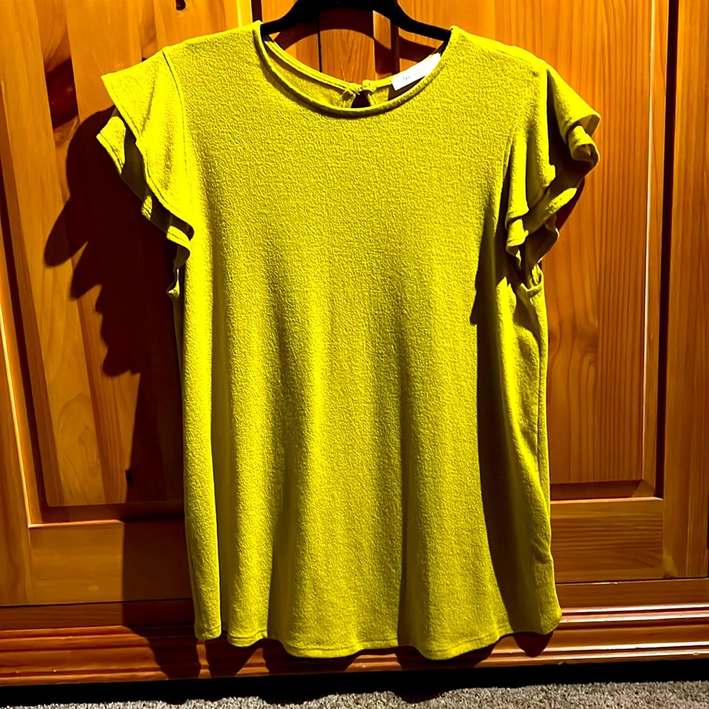 Chartreuse green ruffle short sleeved top.